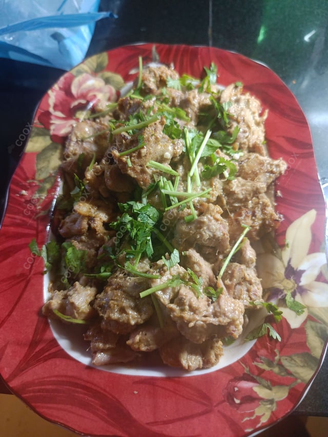 Delicious Murgh Malai Tikka prepared by COOX