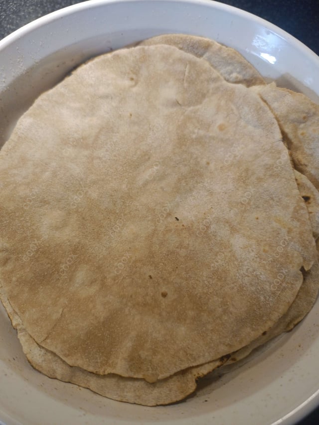 Delicious Tawa Rotis prepared by COOX