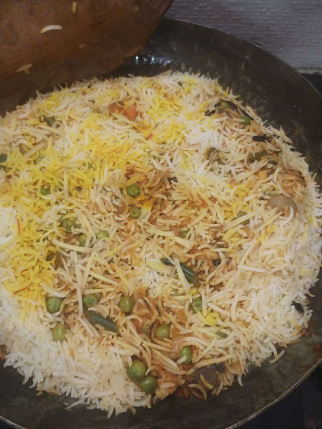 Delicious Veg Biryani prepared by COOX