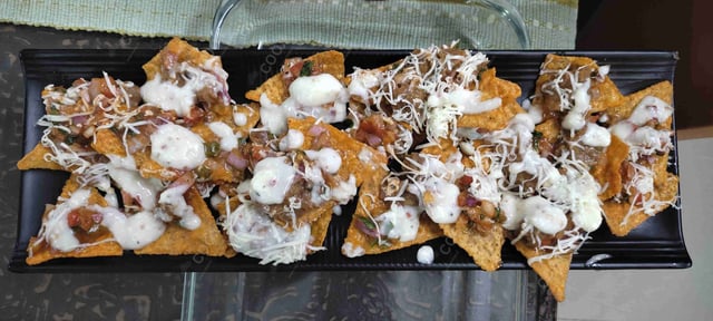 Delicious Cheese Nachos prepared by COOX