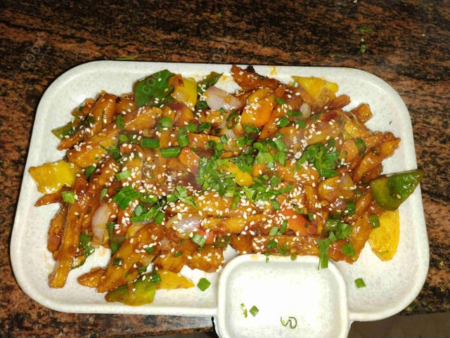 Delicious Honey Chilli Potato prepared by COOX