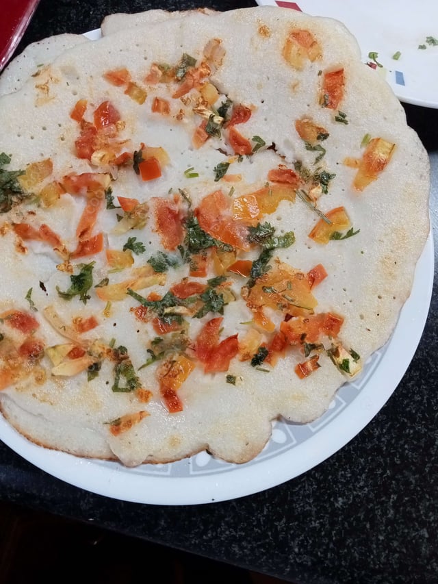 Delicious Mixed Veg Uttappam prepared by COOX