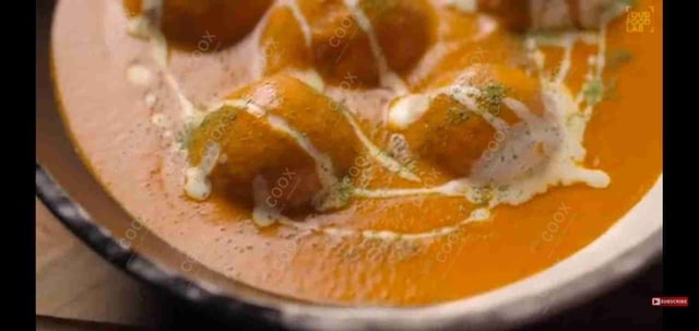 Delicious Malai Kofta (Orange Gravy) prepared by COOX