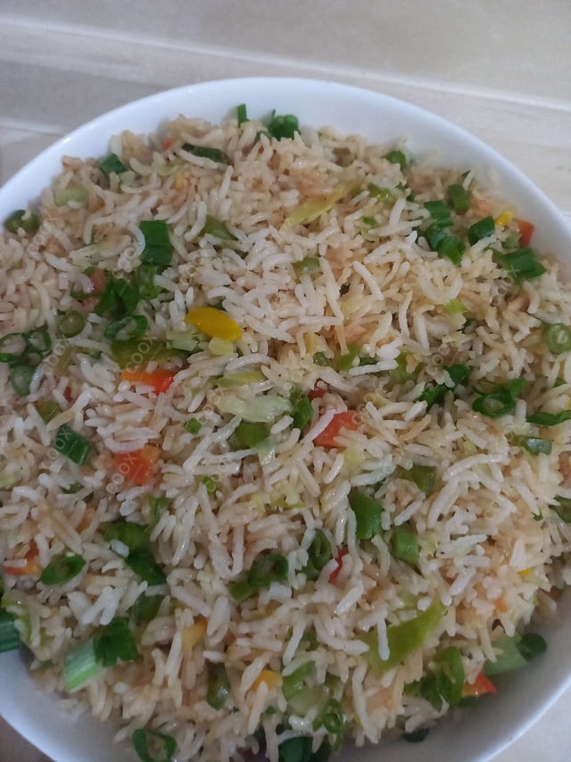 Delicious Veg Fried Rice prepared by COOX