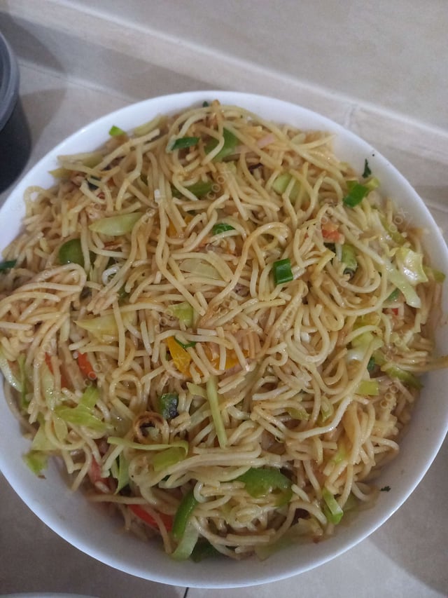 Delicious Veg Hakka Noodles prepared by COOX