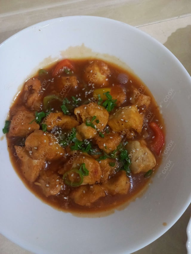 Delicious Chilli Chicken prepared by COOX