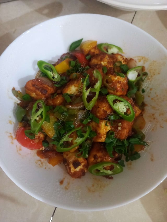 Delicious Chilli Paneer (Dry) prepared by COOX