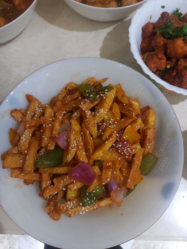 Delicious Honey Chilli Potato prepared by COOX