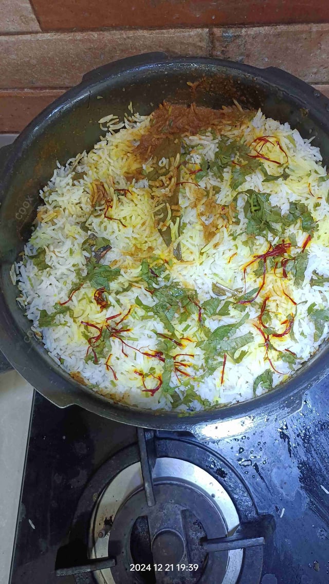 Delicious Chicken Biryani prepared by COOX