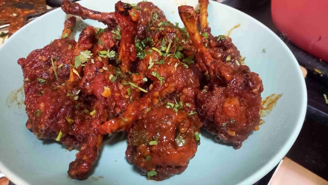 Delicious Chicken Lollipop prepared by COOX