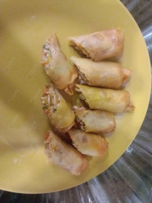 Delicious Veg Spring Rolls prepared by COOX