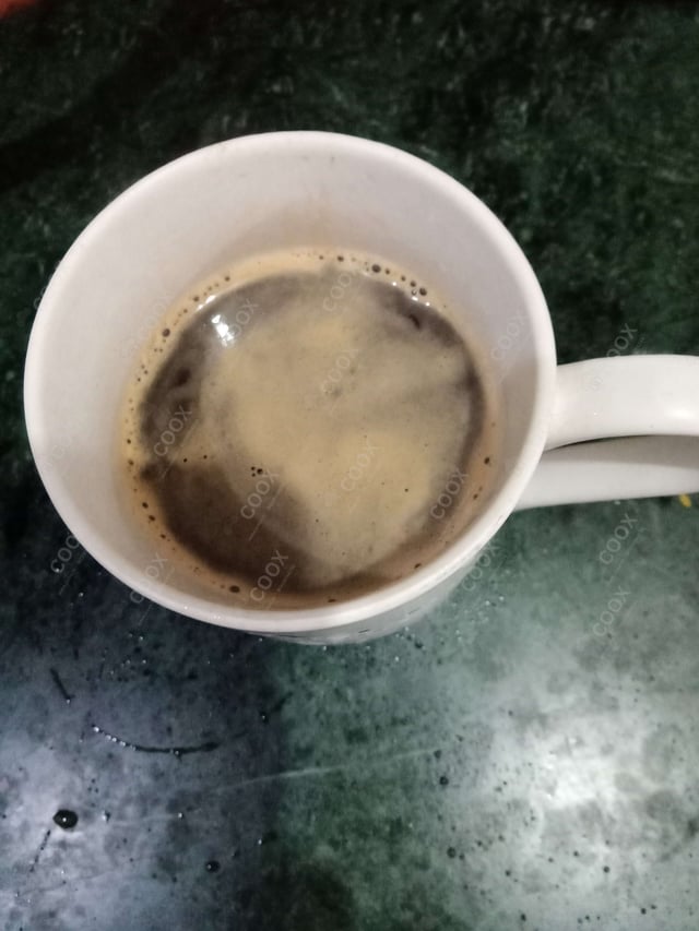 Delicious Hot Coffee prepared by COOX