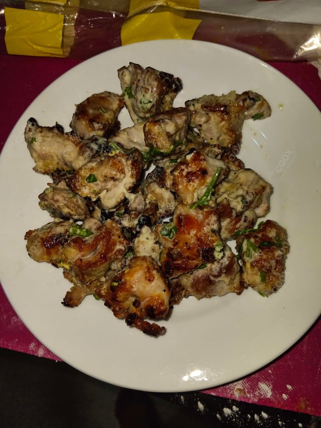 Delicious Murgh Malai Tikka prepared by COOX