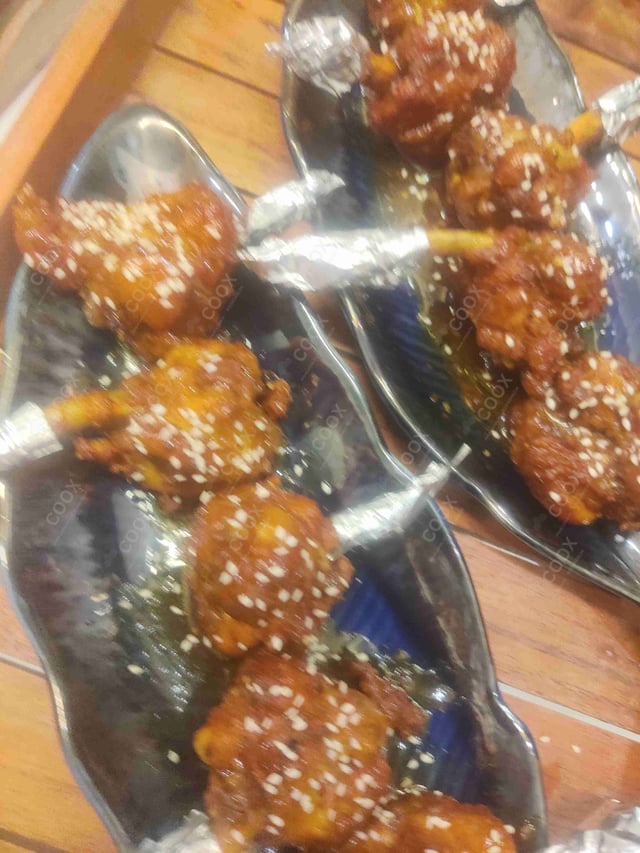 Delicious Chicken Lollipop prepared by COOX