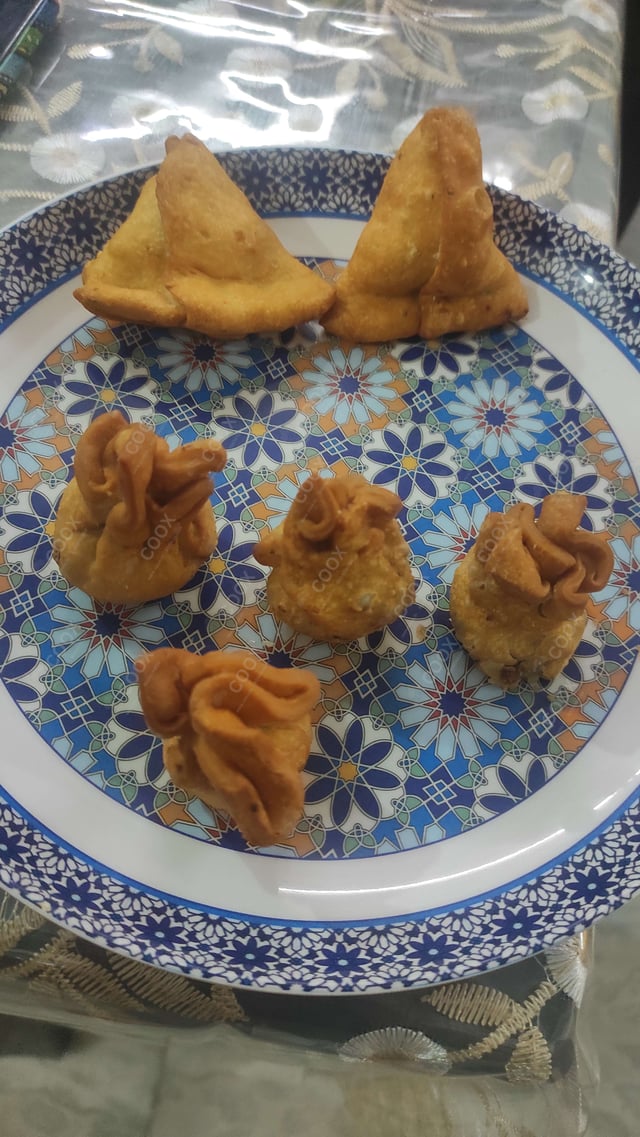 Delicious Mini Samosas prepared by COOX