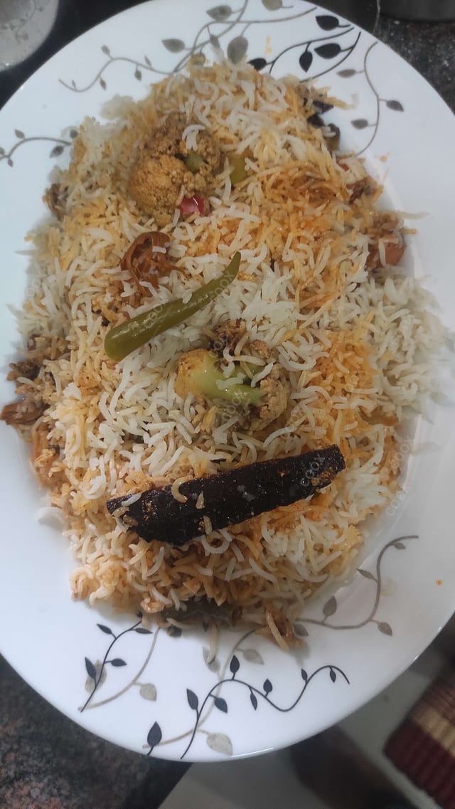 Delicious Veg Biryani prepared by COOX