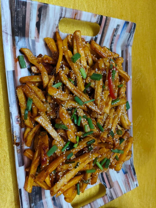 Delicious Honey Chilli Potato prepared by COOX