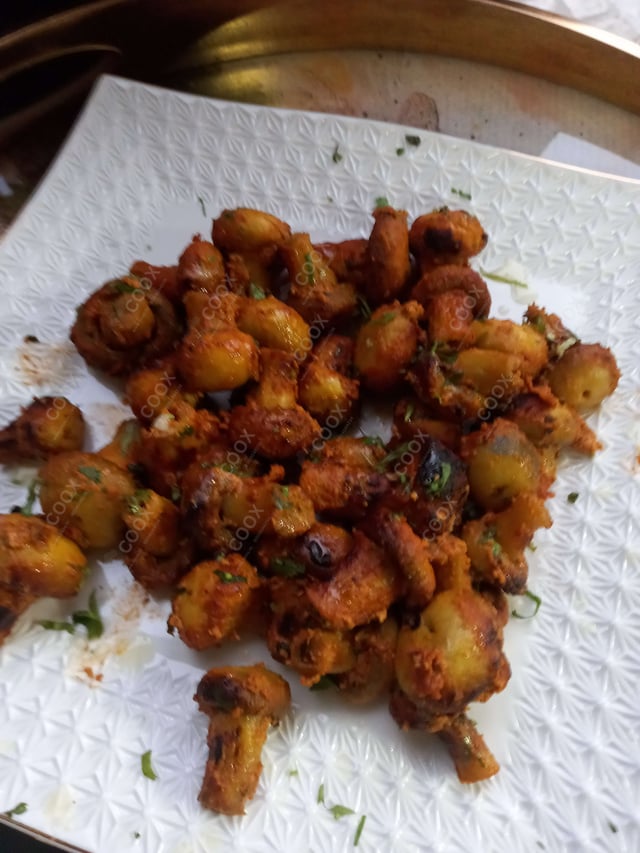 Delicious Mushroom Tikka prepared by COOX