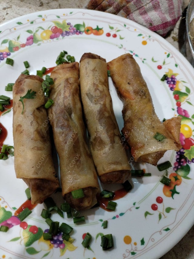 Delicious Veg Spring Rolls prepared by COOX