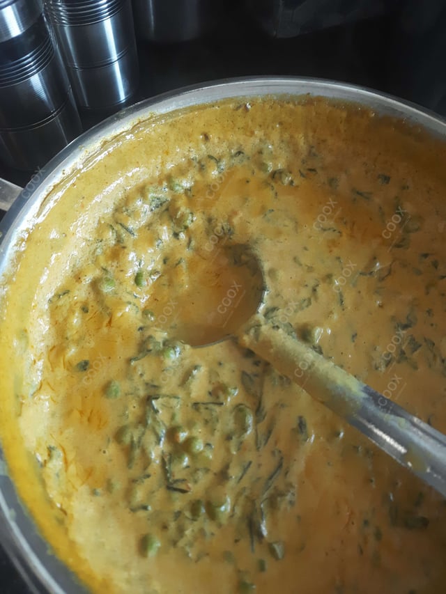 Delicious Methi Matar Malai prepared by COOX