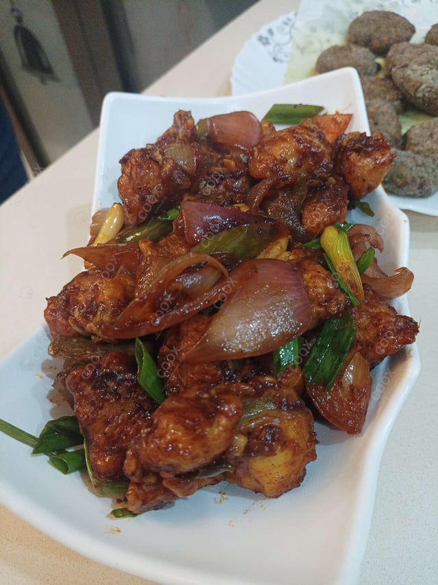 Delicious Chilli  Chicken prepared by COOX