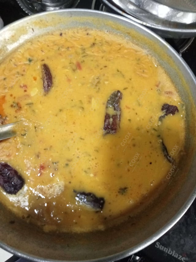 Delicious Dal Tadka prepared by COOX