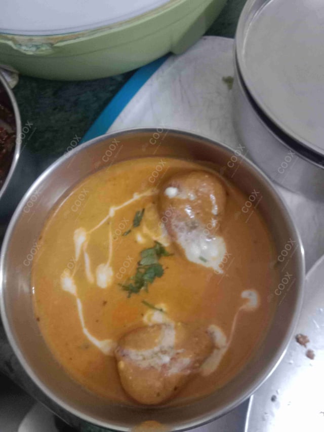 Delicious Malai Kofta (Orange Gravy) prepared by COOX