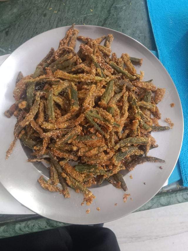 Delicious Kurkuri Bhindi prepared by COOX