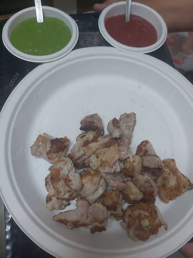 Delicious Murgh Malai Tikka prepared by COOX