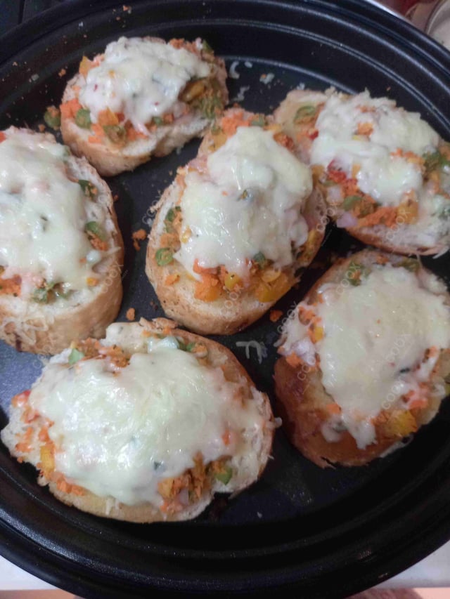 Delicious Garlic Bread with Cheese prepared by COOX