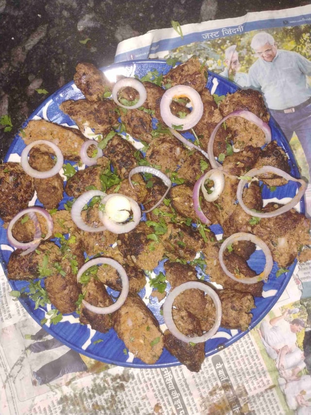 Delicious Mutton Seekh Kebab prepared by COOX