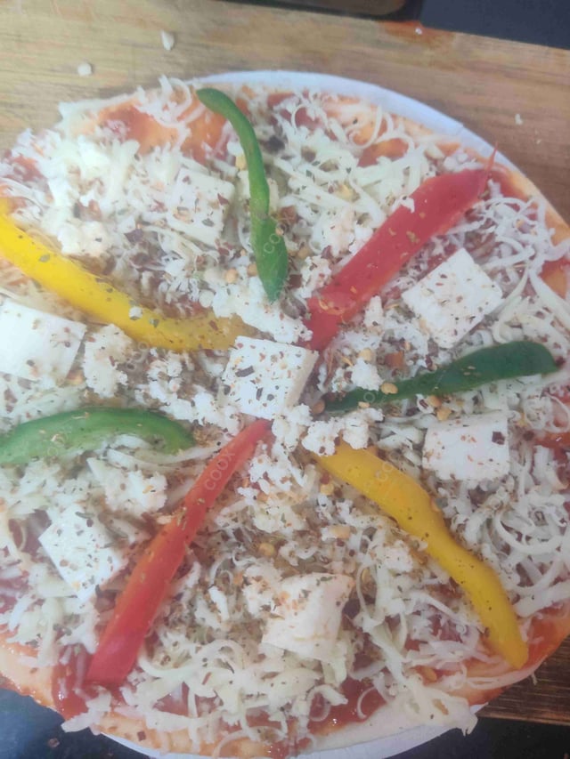 Delicious Veg Pizza prepared by COOX