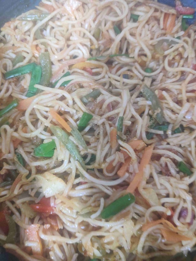 Delicious Veg Hakka Noodles prepared by COOX