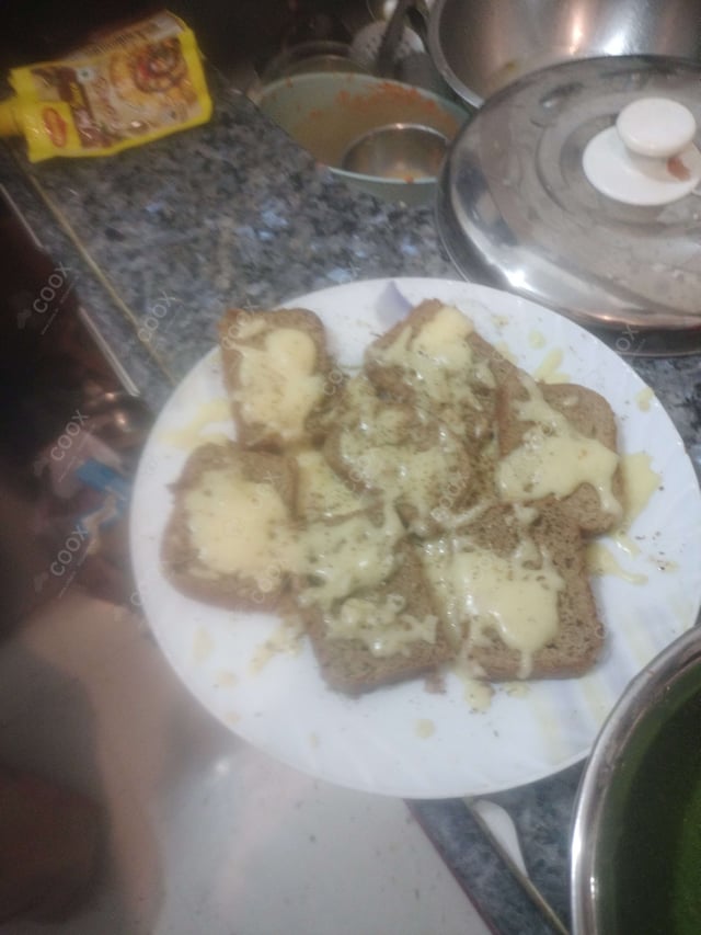 Delicious Garlic Bread with Cheese prepared by COOX