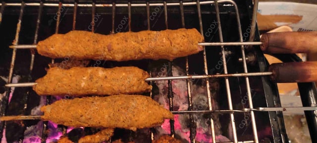 Delicious Mutton Seekh Kebab prepared by COOX