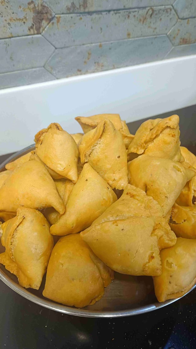 Delicious Mini Samosas prepared by COOX