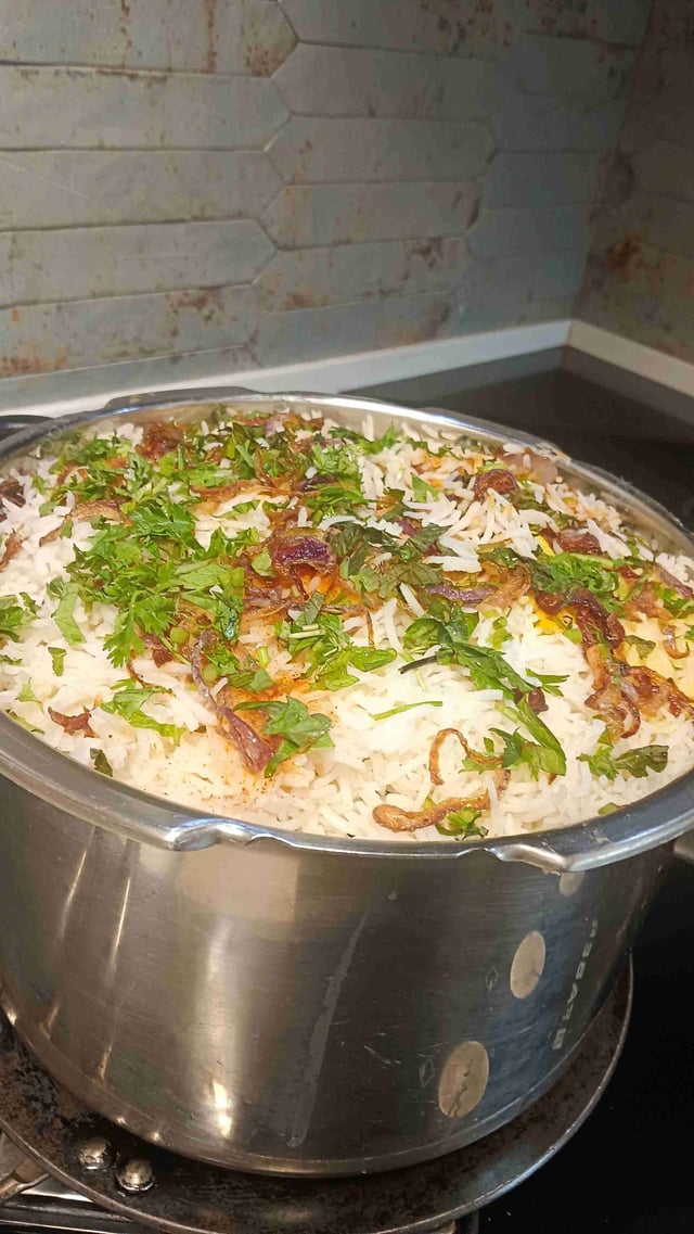 Delicious Veg Biryani prepared by COOX