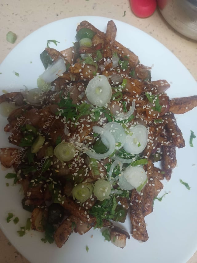 Delicious Honey Chilli Potato prepared by COOX