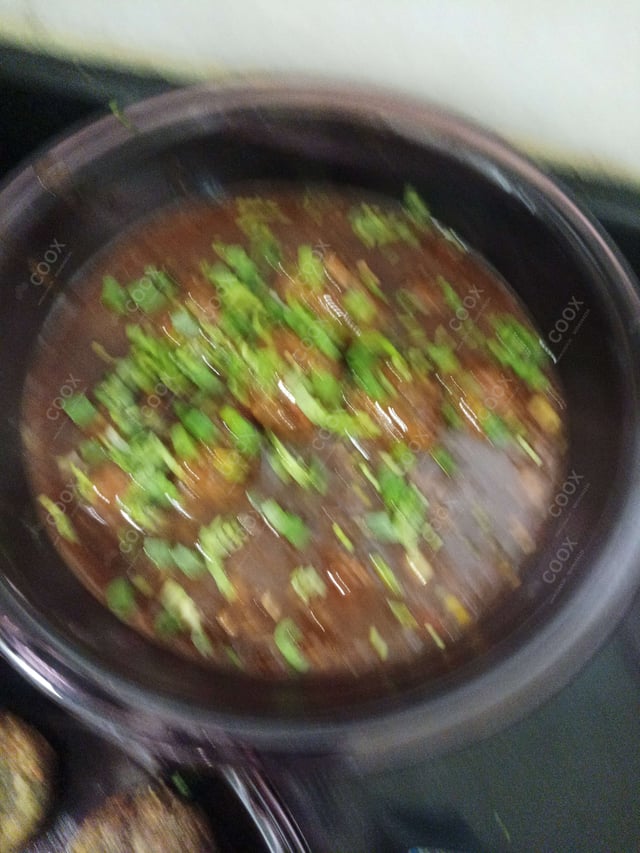 Delicious Veg Manchurian (Gravy) prepared by COOX