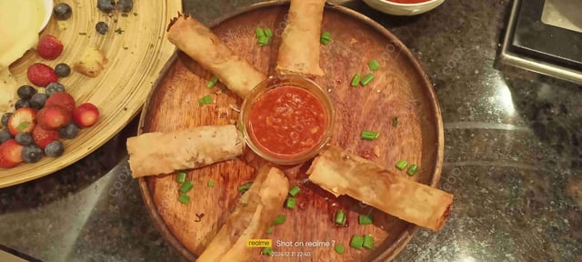 Delicious Veg Spring Rolls prepared by COOX