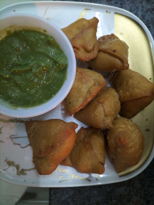 Delicious Mini Samosas prepared by COOX