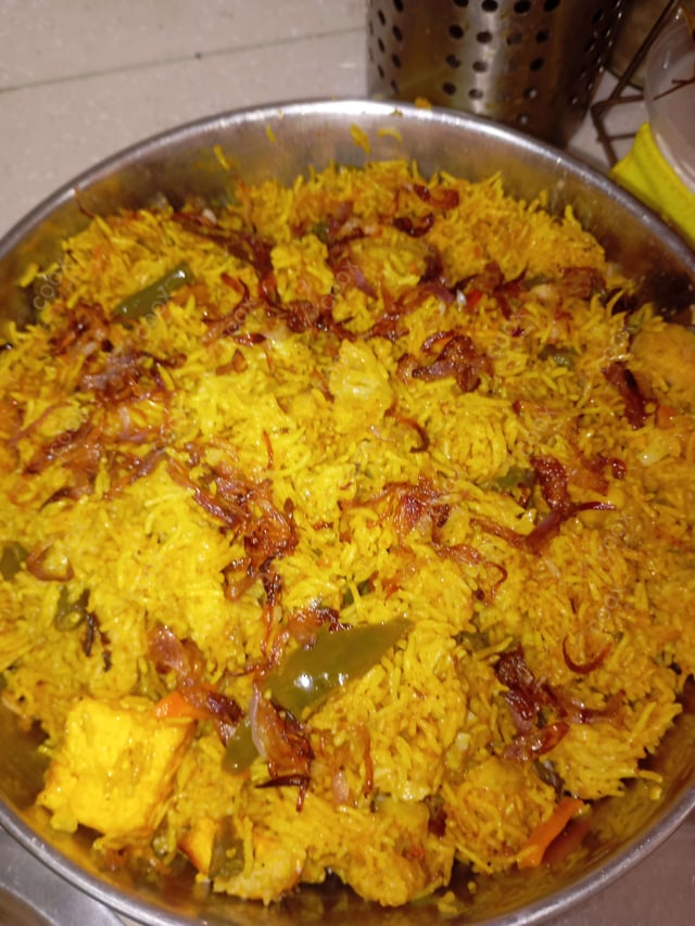 Delicious Veg Biryani prepared by COOX