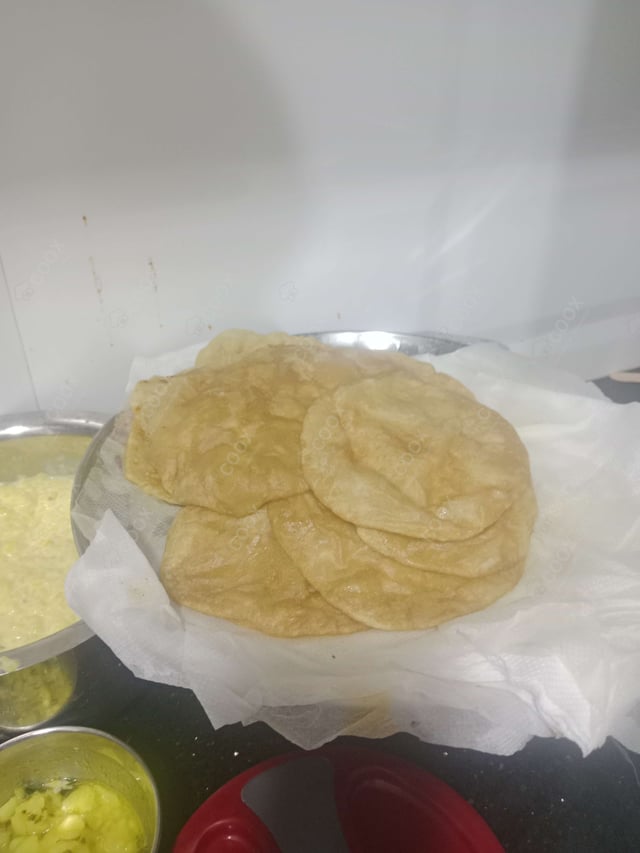 Delicious Bhature prepared by COOX