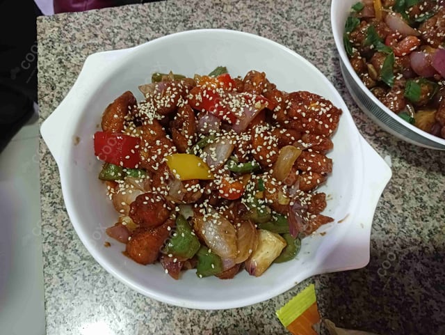 Delicious Crispy Chilli Baby Corn prepared by COOX