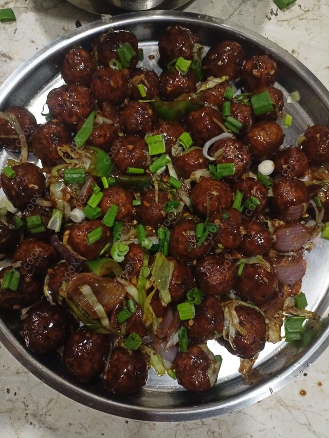 Delicious Veg Manchurian (Dry) prepared by COOX