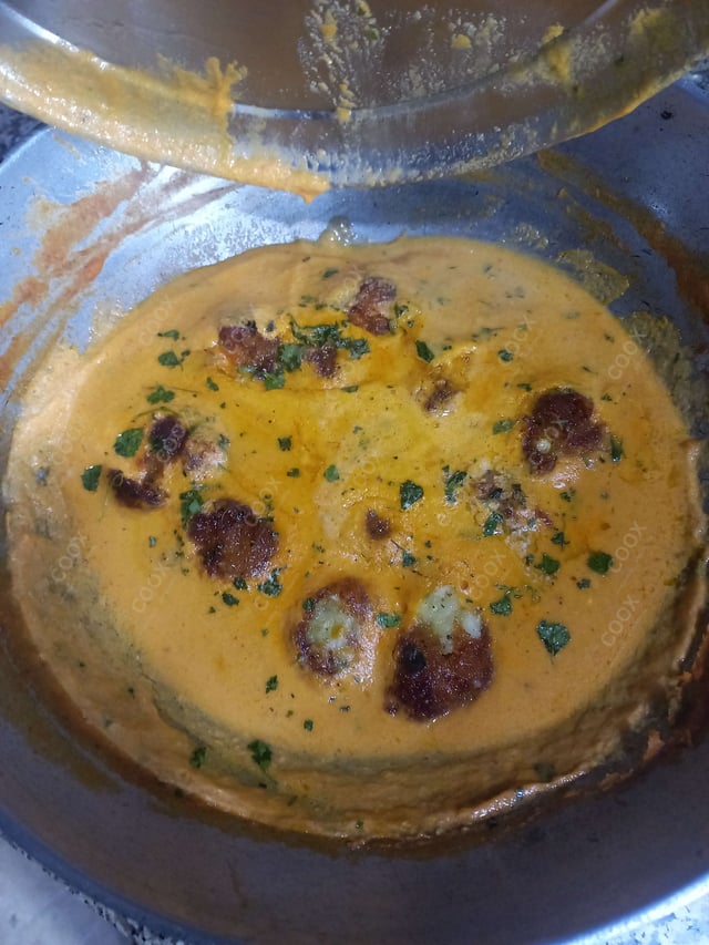 Delicious Malai Kofta (Orange Gravy) prepared by COOX