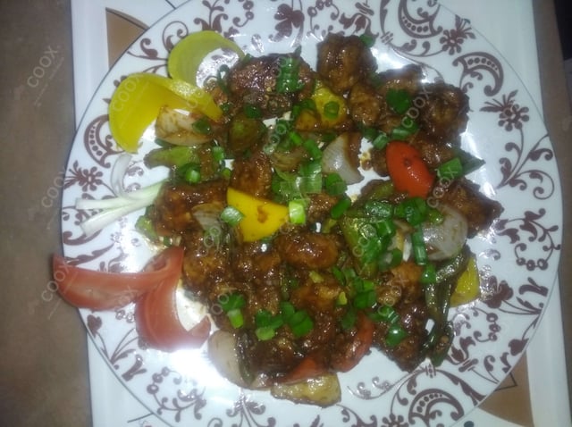 Delicious Chilly Chicken prepared by COOX