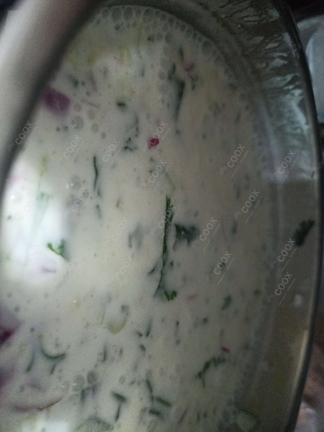 Delicious Mix Veg Raita prepared by COOX