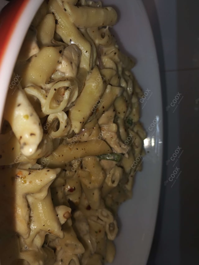 Delicious Chicken Pasta in White Sauce prepared by COOX