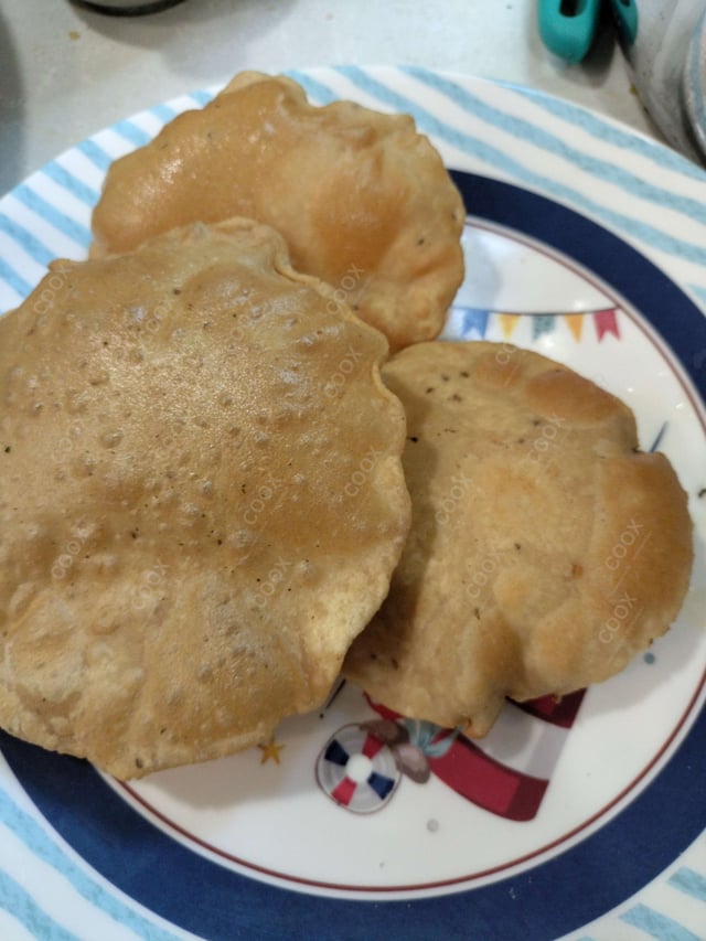 Delicious Pooris & Bedmis prepared by COOX